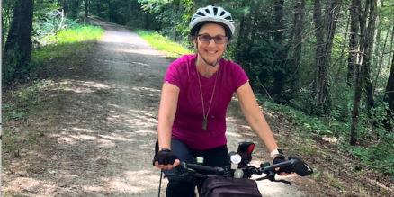 Miki riding her new electric bike